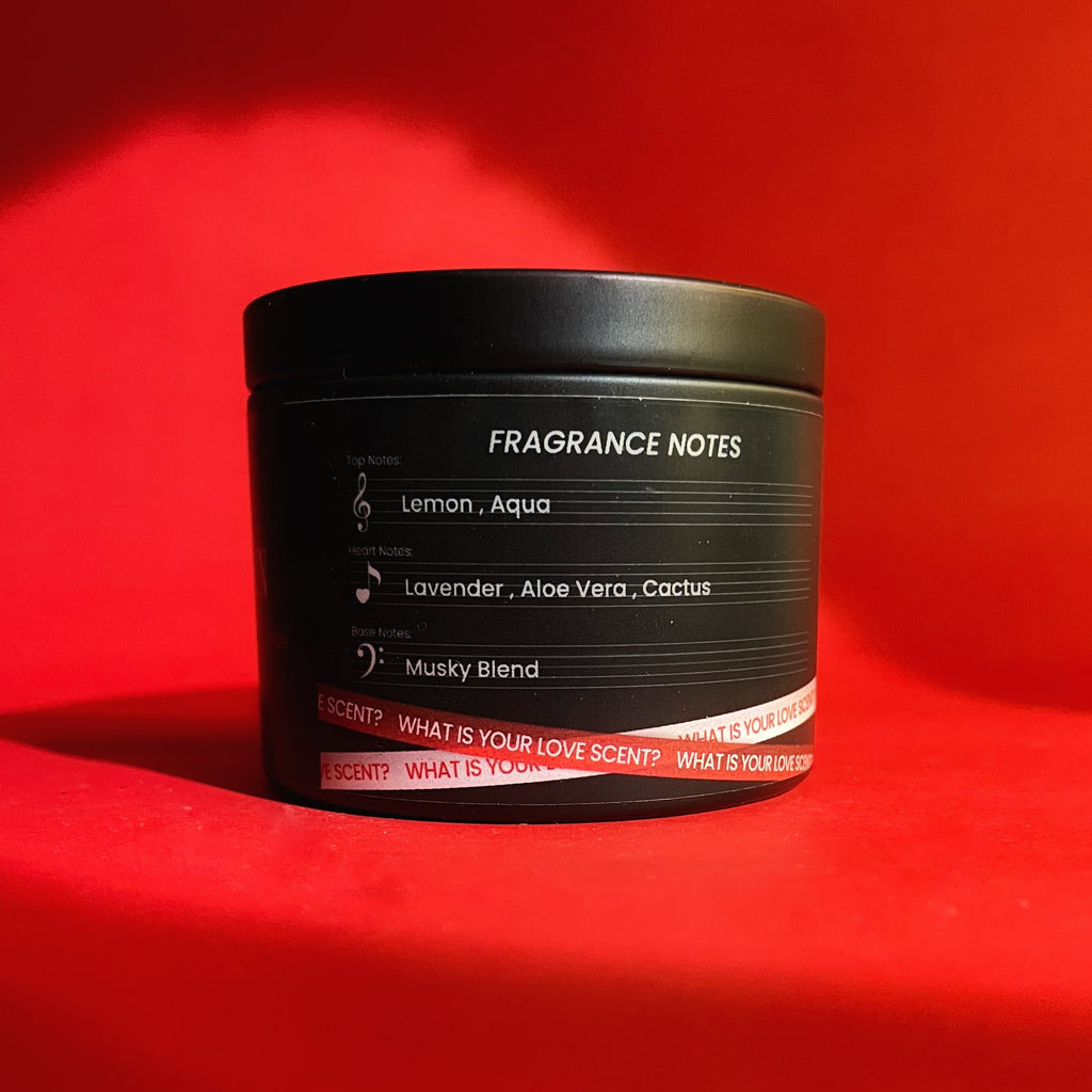 Black container with fragrance notes on a red background