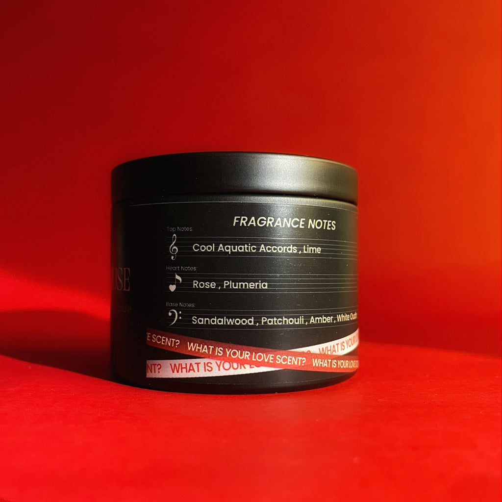 Black container with fragrance notes on a red background - V, taehyung, bts